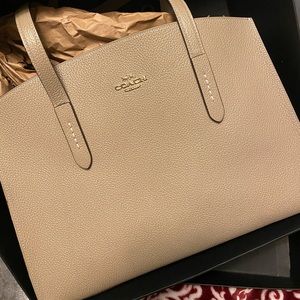 Coach Charlie Carryall